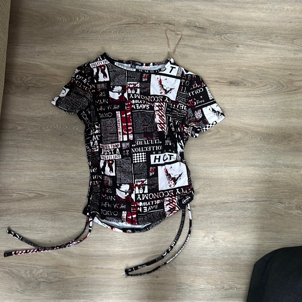 Black red and white newspaper shirt